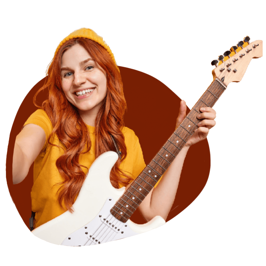 man in blue smiling and pointing to the right