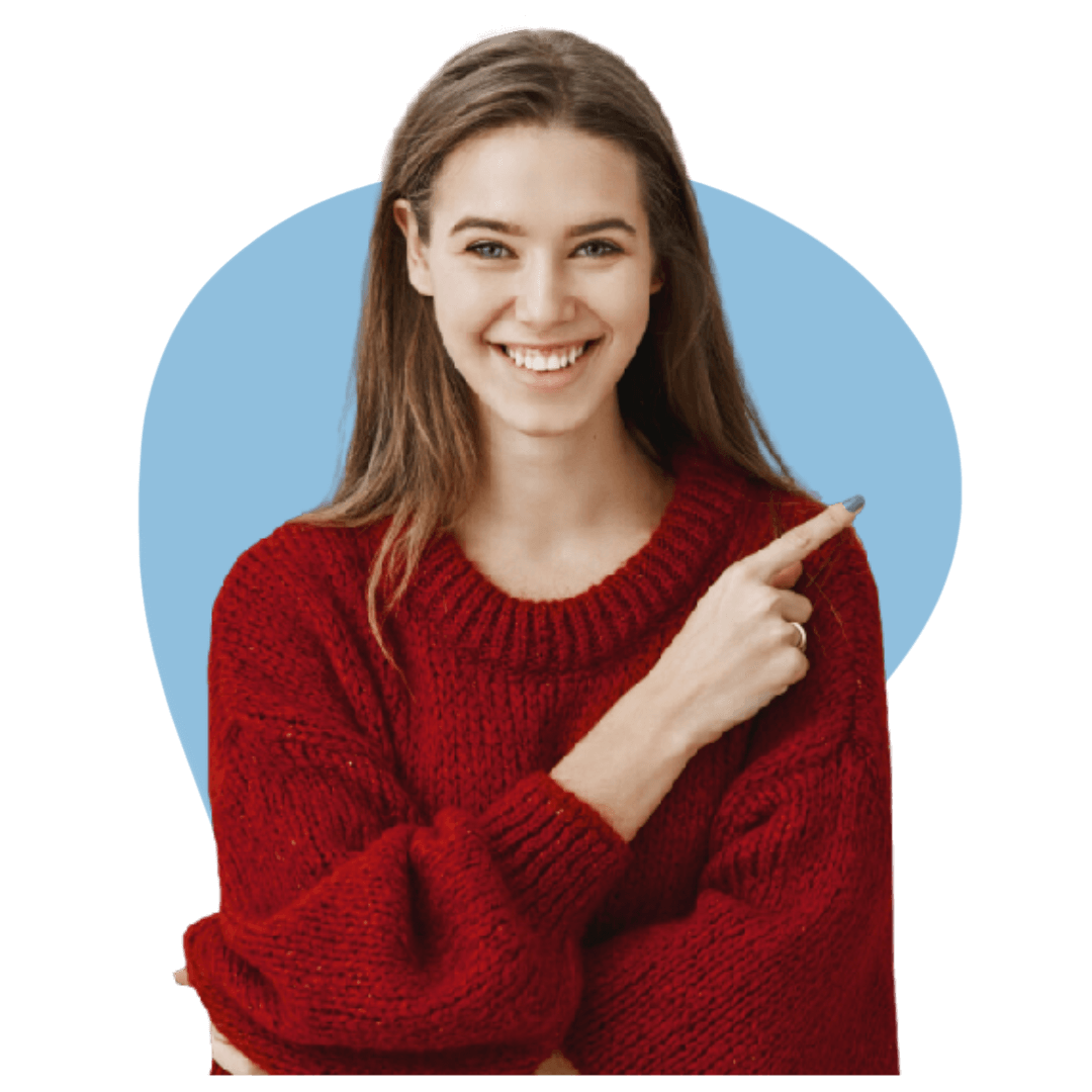 man in blue smiling and pointing to the right